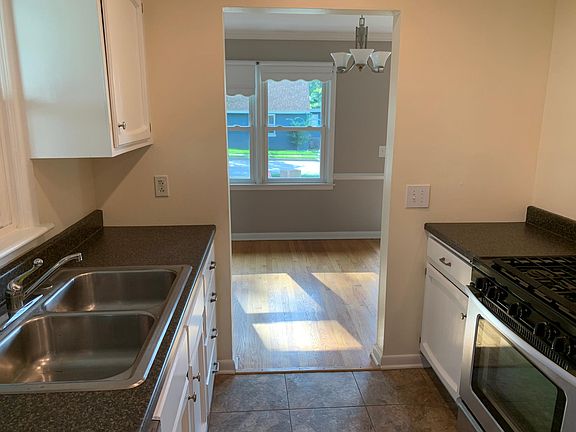 Standing in kitchen looking out to front of house.
