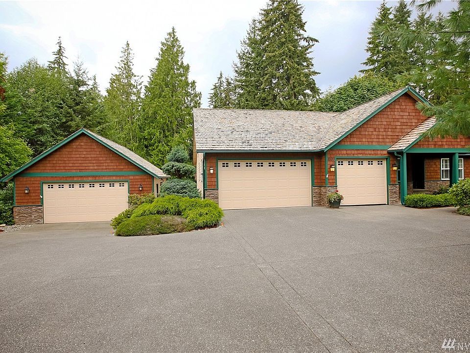 Welcome to your beautiful Pacific Northwest home embraced by luxurious landscaping. Ever changing plantings means there is beauty in every season!  These gorgeous ornamental plums explode with pink flowers in the spring......breathtaking!