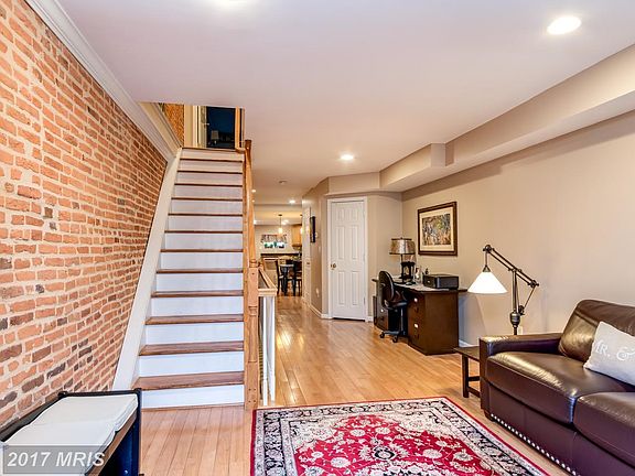 Living Room w/exposed brick wall