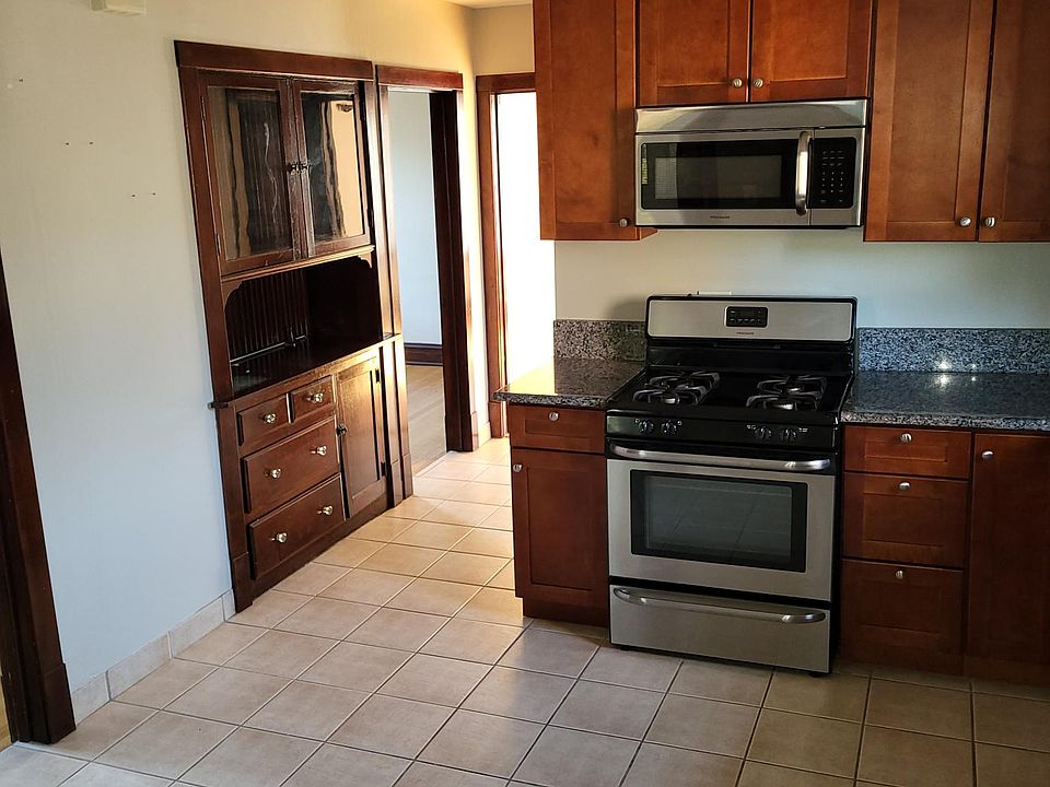 Kitchen area looking towards hallway that leads to living room