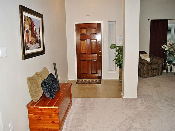 DRAMATIC ENTRY IN THIS OPEN FLOOR PLAN