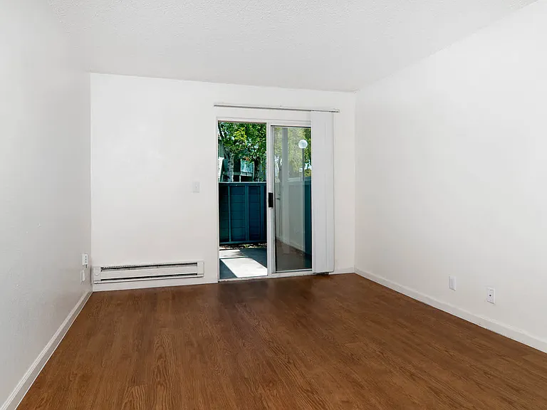 Living Room with Patio and Hard Surface Flooring