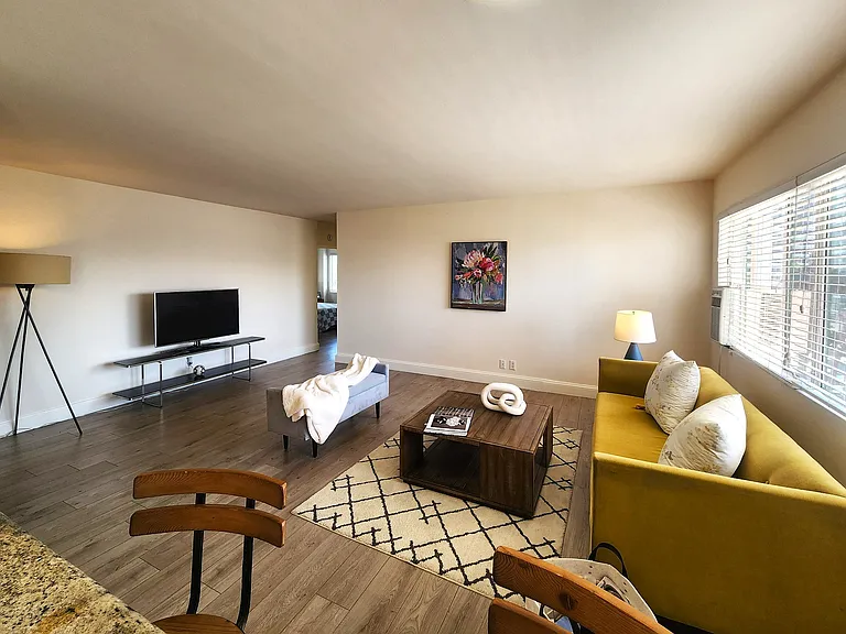 401 Living Room sunny and bright
