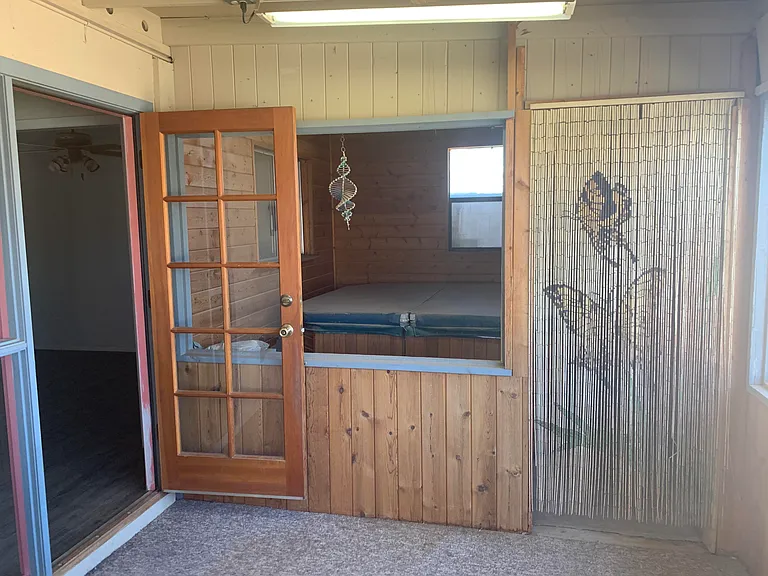 Screened porch and Hot tub off of Main Bedroom