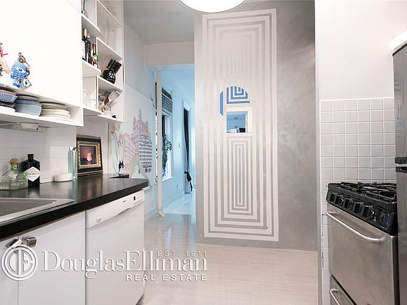 3rd image of 32 E 2nd St APT 10