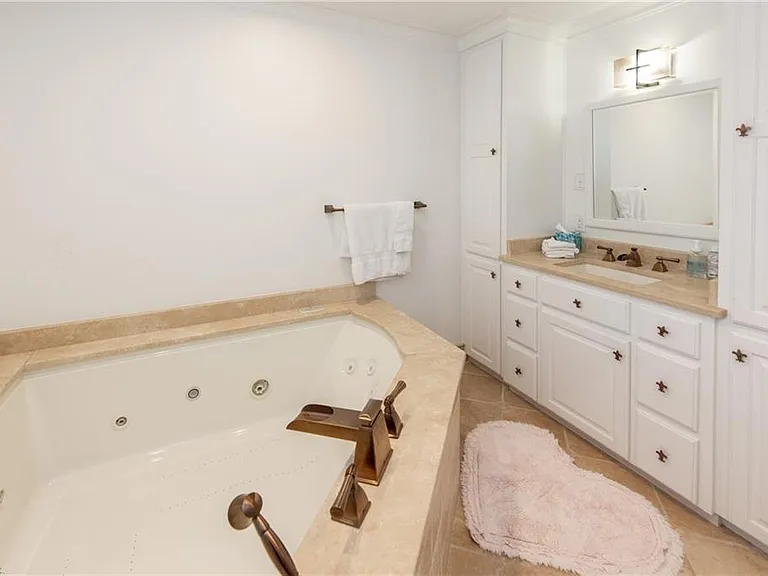 Master bedroom has a 2 person jacuzzi bathtub, bidet toilet, and huge shower with 6 shower heads.