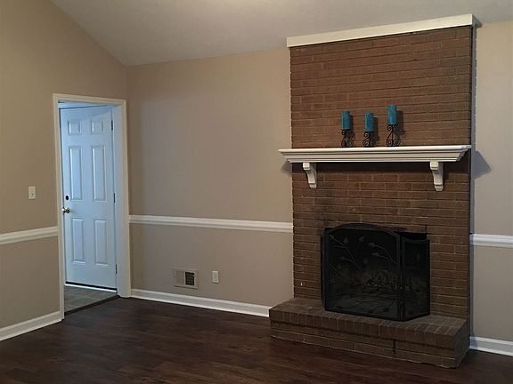 ... large family room with fireplace, new flooring and new c