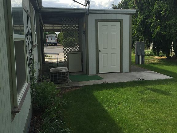 STORAGE ROOM UNDER CARPORT