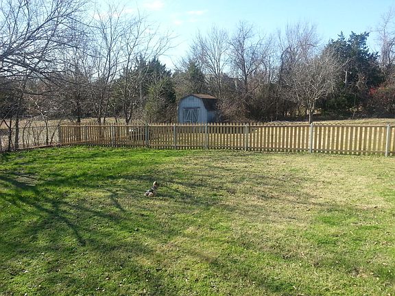 fenced back yard