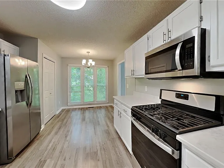 3912 Sharpel Ln NW — Photo 4