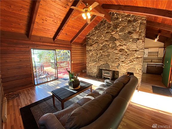 Floor to ceiling rock fire place