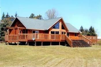 Custom home on six acres, oversized deck and a stocked pond. Inside you will find an oak kitchen wit