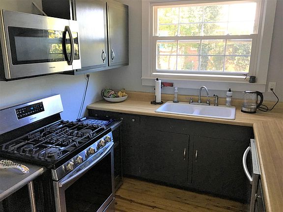 A cook's kitchen with a professional-grade gas stove.