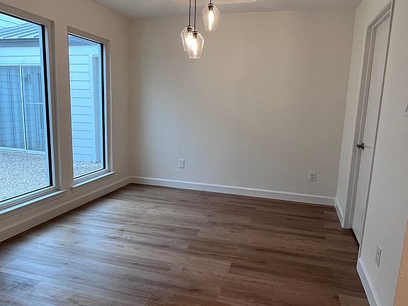 Breakfast area attached to the kitchen. Laundry room off of breakfast area which leads to two car garage.