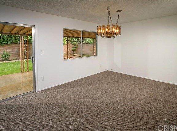The formal dining room fittingly adjoins the kitch