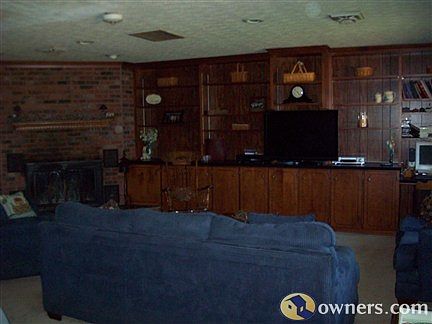 living room view from kitchen, custom shelving