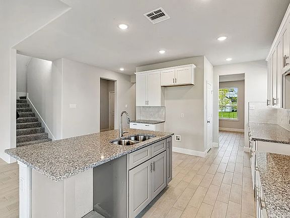 Kitchen *Representative Builder Photo _ Actual finishes may vary.