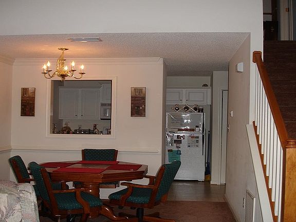 Standing in the living room facing kitchen