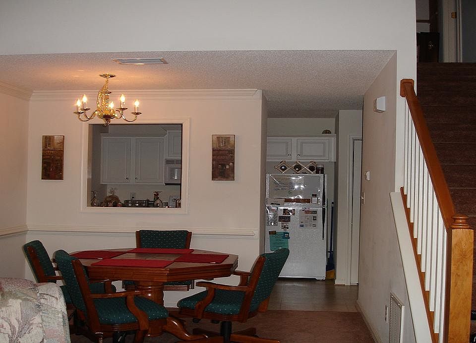 Standing in the living room facing kitchen