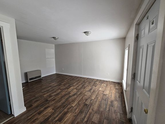 Living room. Full bath and bedroom off of this room.
