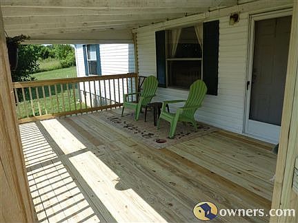 Under-roof seating area on new front porch