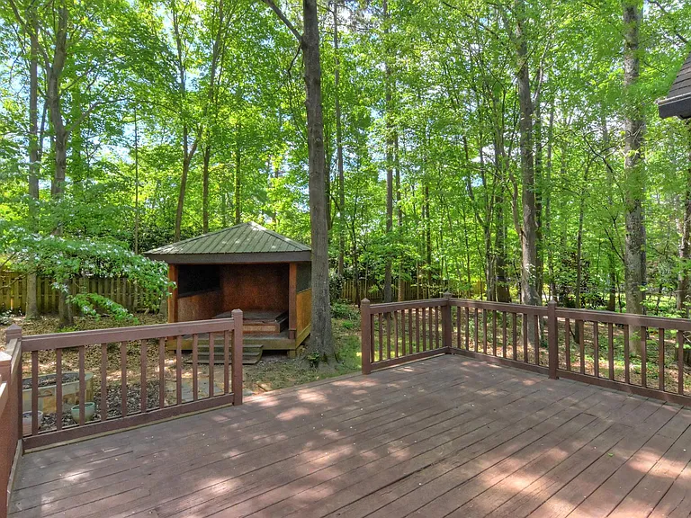 deck and gazeboThere is a hot tub, not available for use in the gazebo. (It doesn't work.). There is a cover on it.