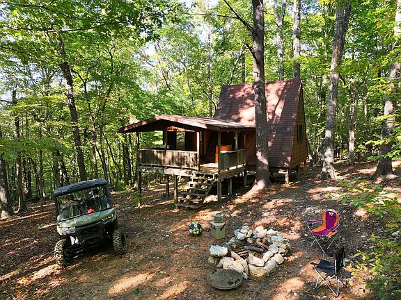 Cabin on secluded wooded acreage for sale near the Smith River in Patrick County, VA - by Justin Rolfe, Mossy Oak Properties Lan