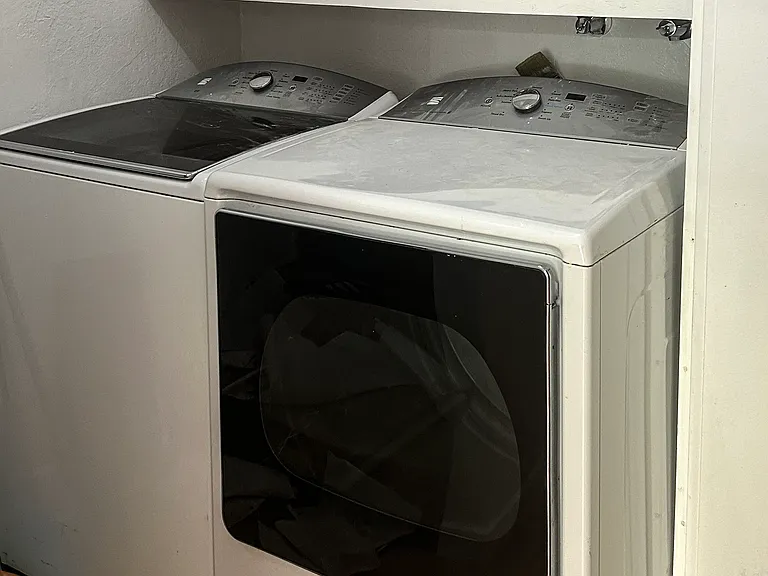 Oversized washing machine and dryer.