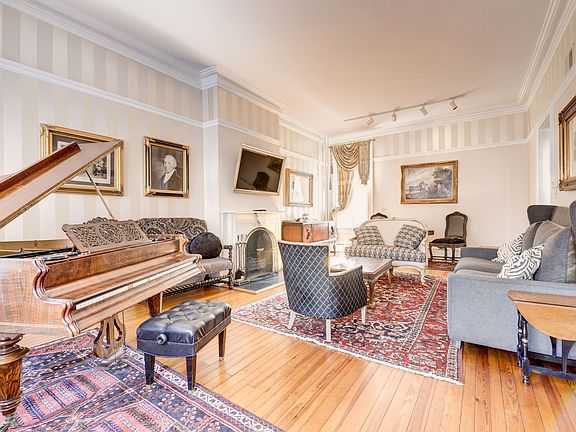 Double Parlor with plaster moldings & heart of pines floors