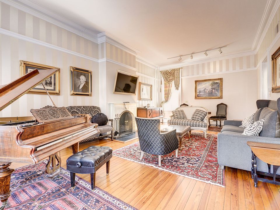 Double Parlor with plaster moldings & heart of pines floors