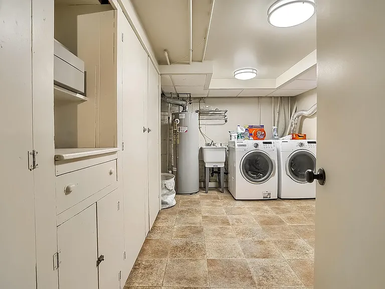 Basement laundry and storage closets