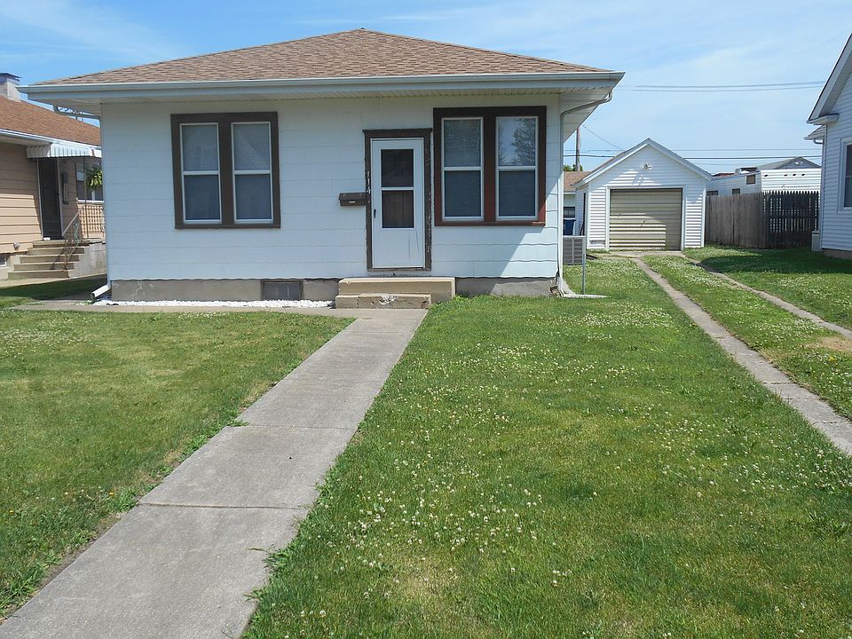 1st image of 114 E 1st St