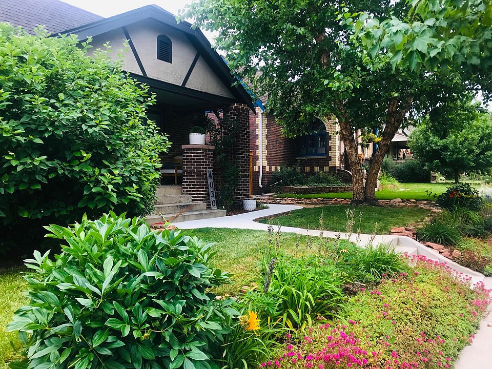 Front exterior with beautiful perennial gardens