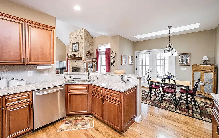 Kitchen w/solid surface countertops and SS appliances