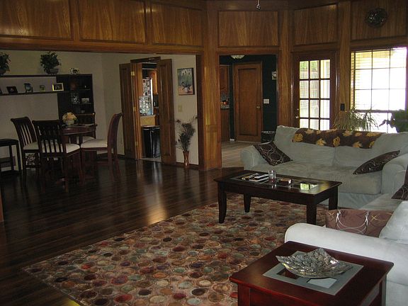 Living room looking to kitchen and dining room