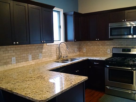 Kitchen w granite countertop