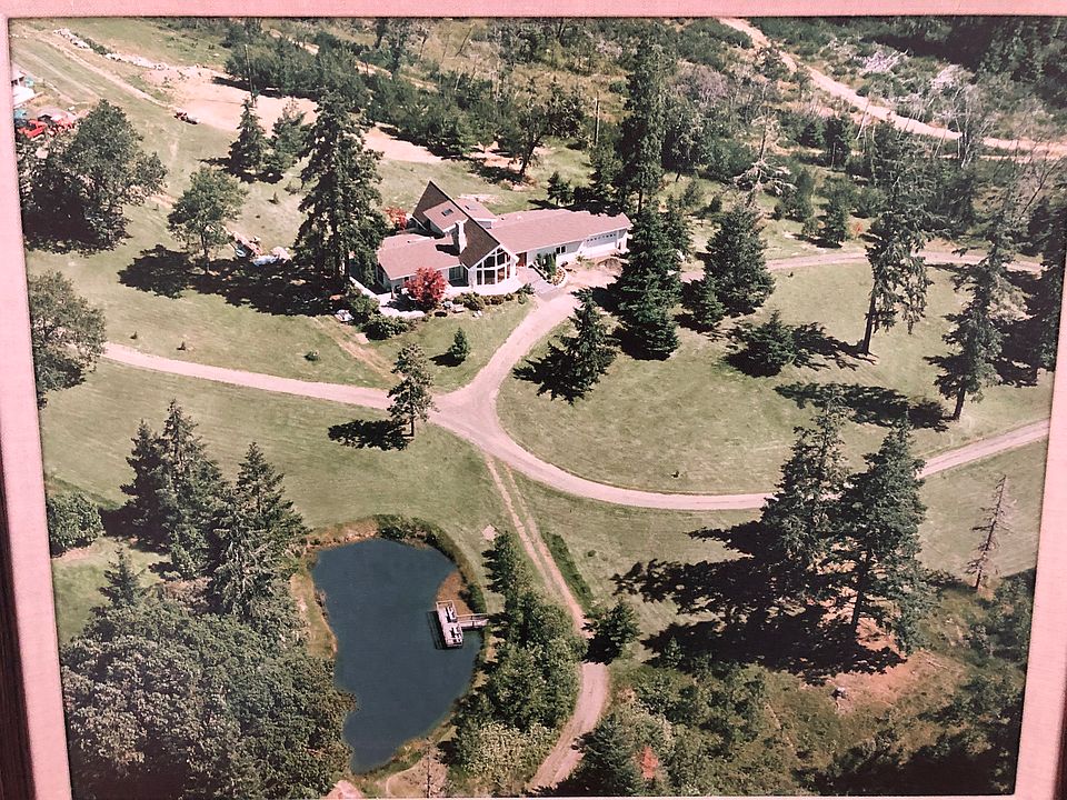 51 acres; 2 homes/barn &shop