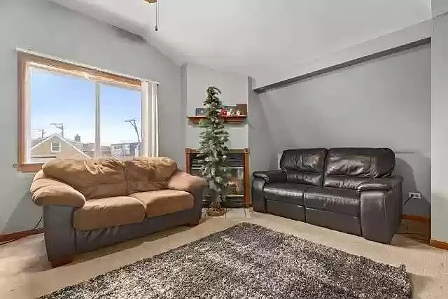 Building Photo - 5216 S Laramie Ave #2