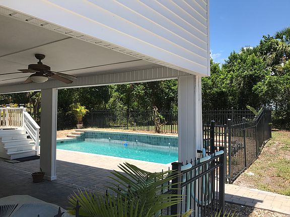 BBQ area beside pool