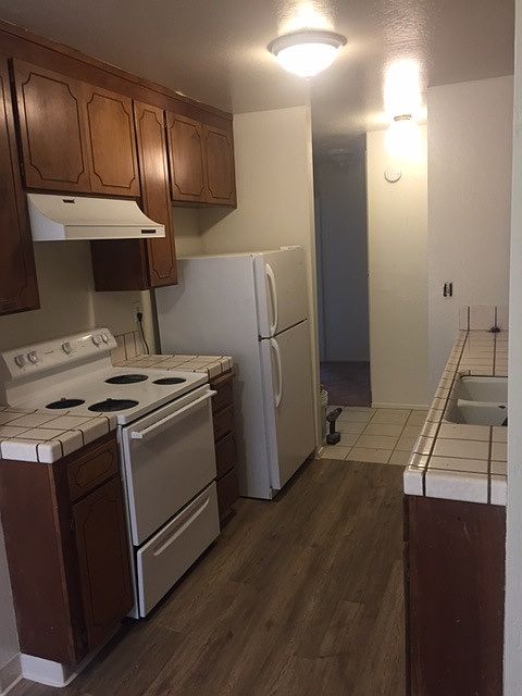 Kitchen includes Refrigerator