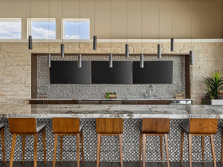 Resident Kitchen with Bar Seating and Ample Counter Space