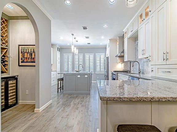 The kitchen has wonderful soothing colors that draws you in