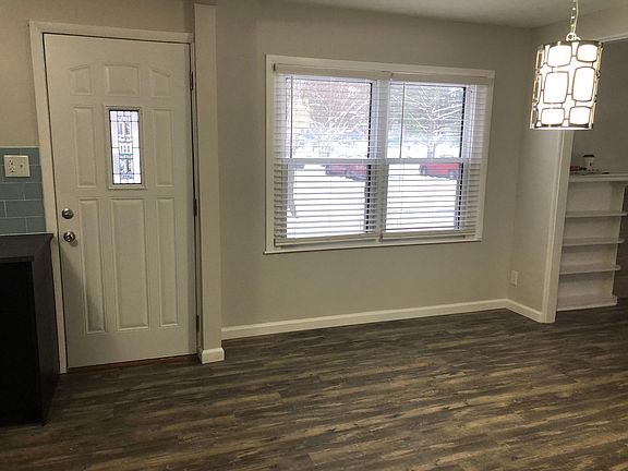South entry of duplex off of kitchen and dining room area
