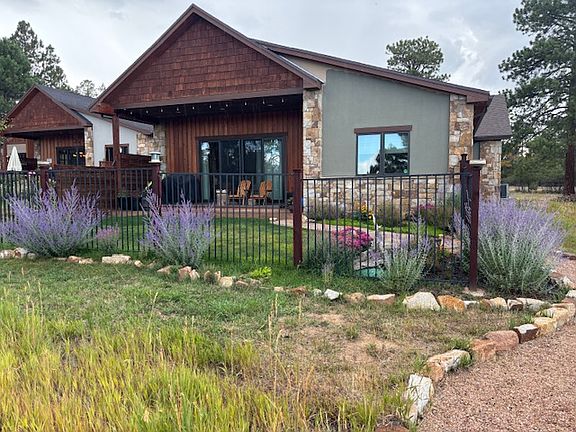 Golf course side of house with path to cart path. Cross country skiing is permitted on course.