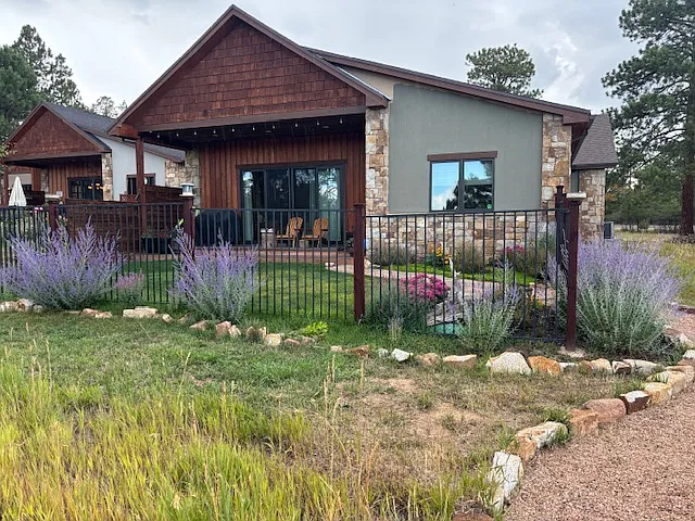 Golf course side of house with path to cart path. Cross country skiing is permitted on course.