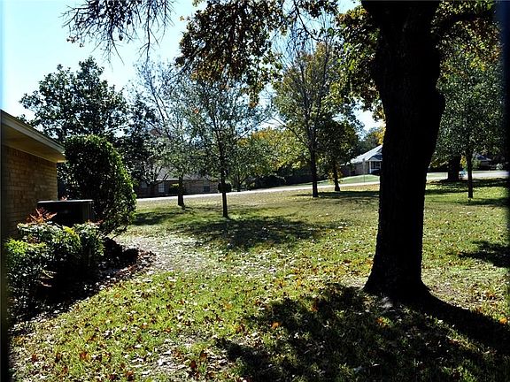 This street offers a deep set back for homes with trees and privacy.
