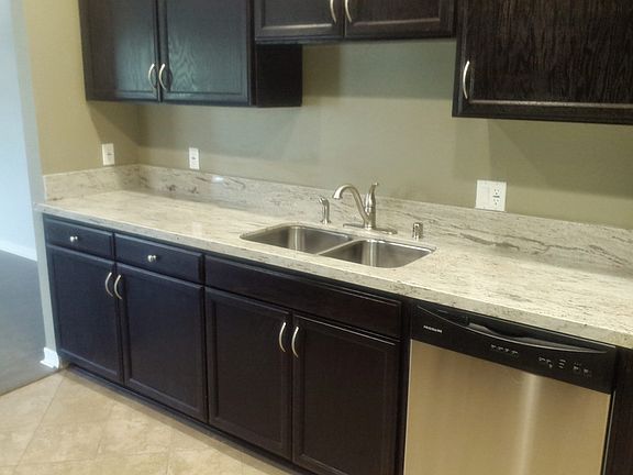 Granite counters with solid wood cabinets