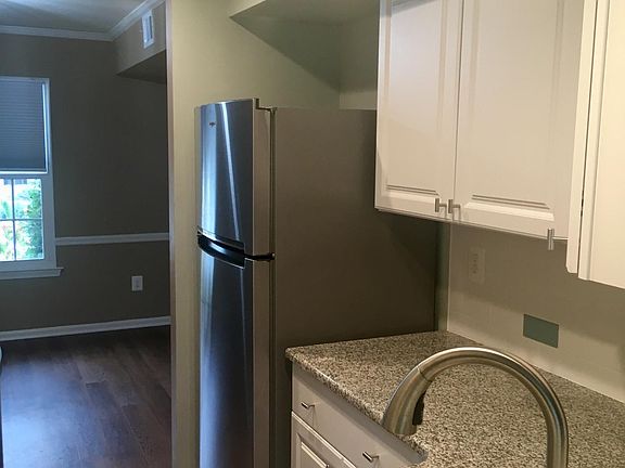 Appliance package includes: Refrigerator, undercounter Dishwasher, cleantop electric Range, over-the-Range Microwave, and food waste disposal.