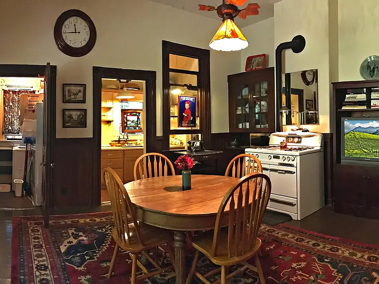 Dining Room Panorama With Pantry on the Left, Kitchen Entry Center and Hallway to Front Door on the right.