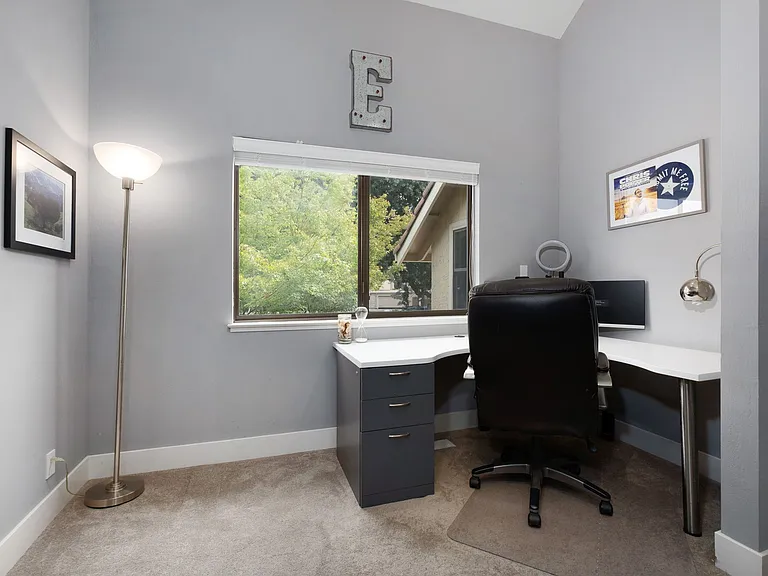 2nd Floor: Home office loft with beautiful outdoor views and open concept feel as opens up to large vaulted living room. Upstairs bedroom & bathroom up here also.
